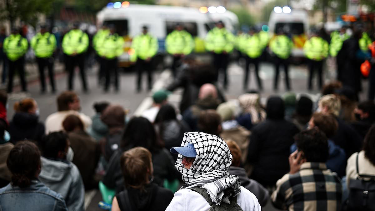 The mobs organising anti-immigration raids across Britain: How growing network of left-wing groups are calling on supporters to stop police seizing migrant suspects and offer tips on how to avoid being arrested [Video]