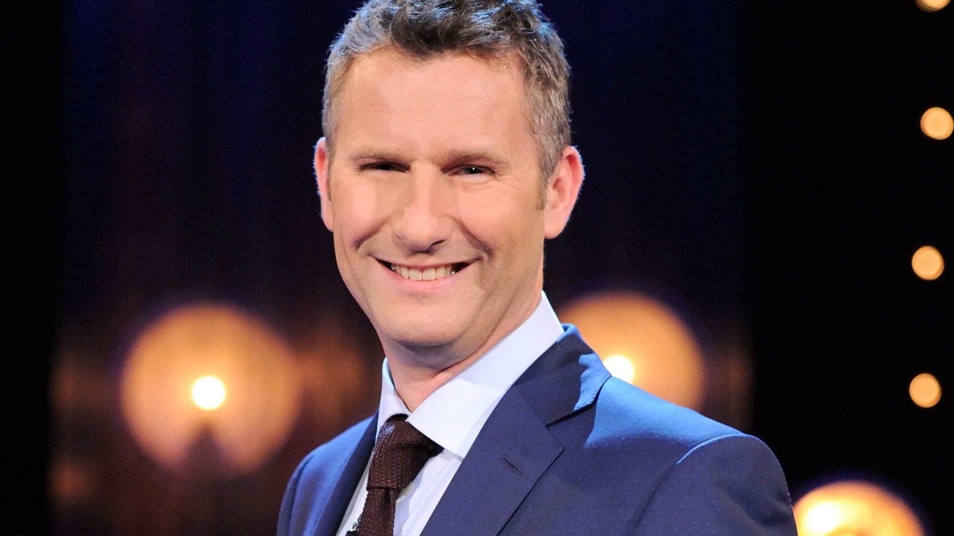 Comedian Adam Hills in shock career change as he takes up major sports role [Video]